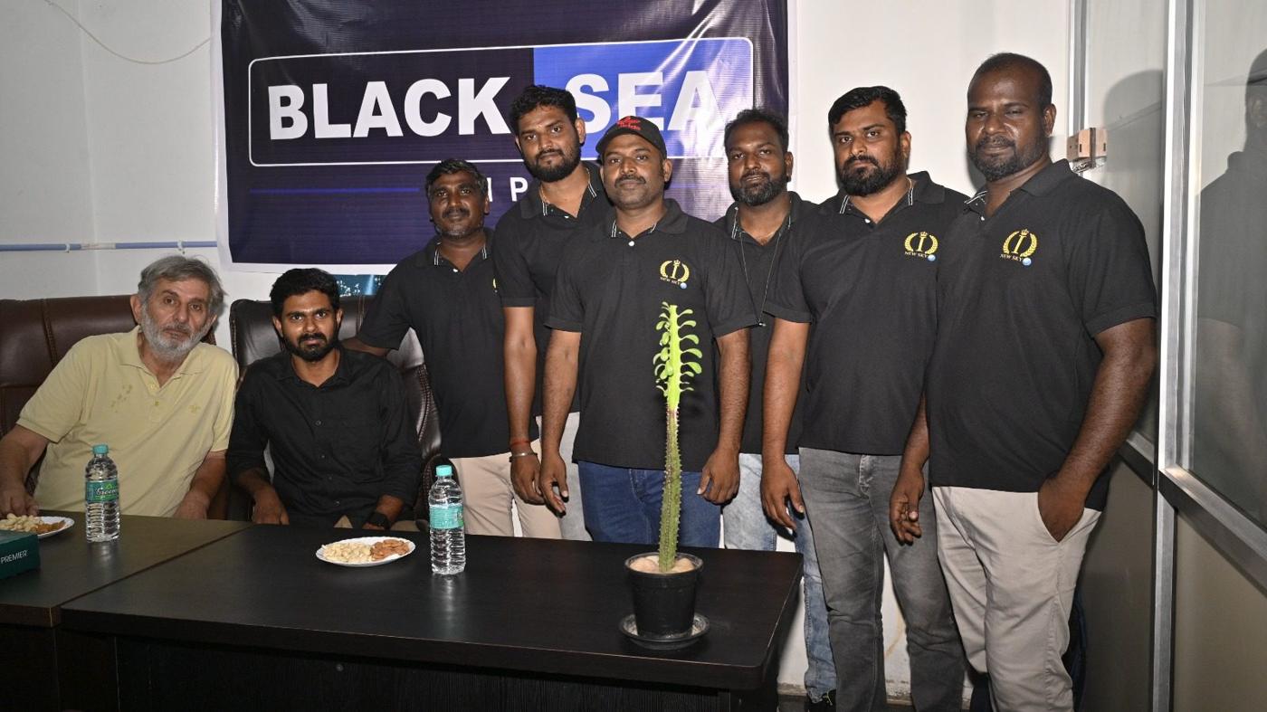 Black Sea PMP India team in front of the company banner