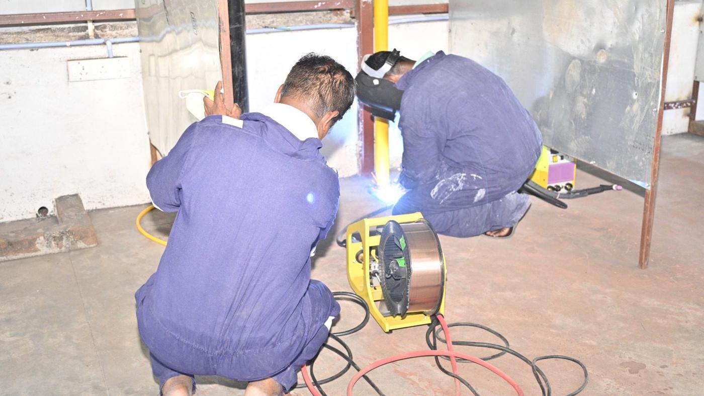 Welding skill test in the assessment booth